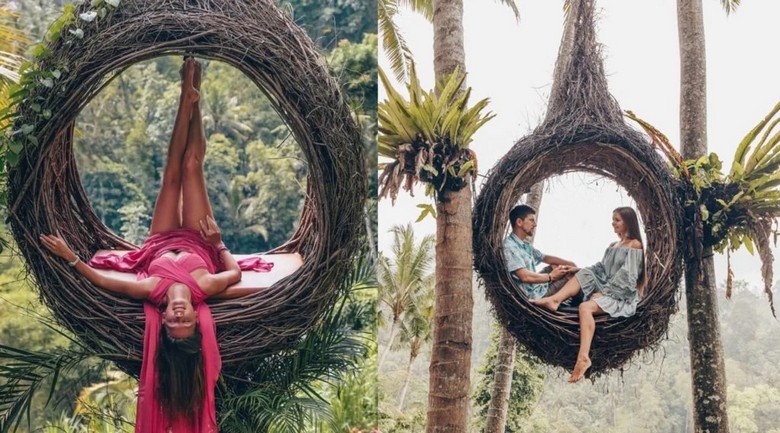 Khách tạo dáng sống ảo trong xích đu lồng chim, phía sau là khu rừng Ubud